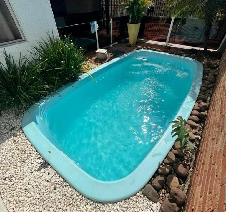 Santos Dumont Apartment | 10 - Casa completa com piscina, Wi-Fi e Garagem