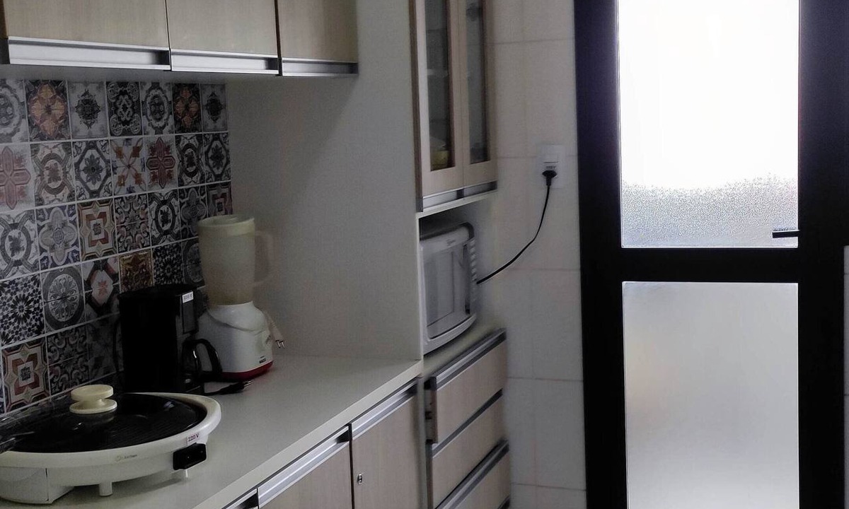 Mongagua Apartment | 2-bedroom apartment, one block from the beach, with garage and elevator.