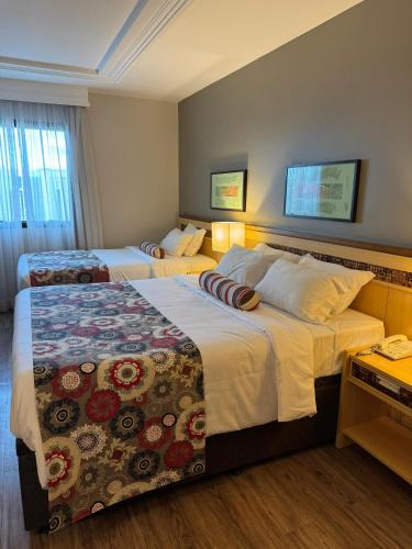 Setor Hoteleiro Norte Hotel | Alto Padrão - Cama Queen e Viuvão no Hotel Let's Idea