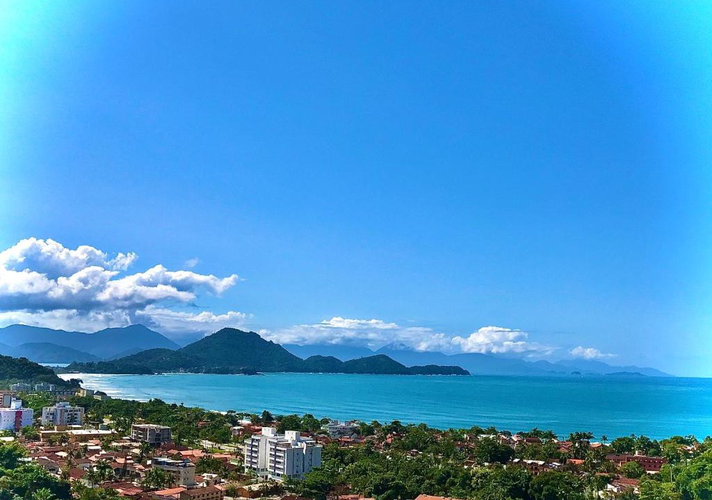 Toninhas Apartment | Amplo apê condomínio piscina Toninhas Ubatuba