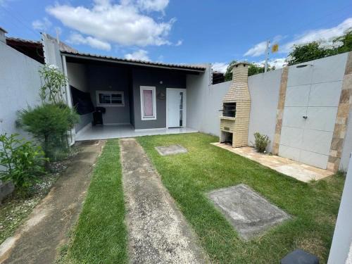 Itaitinga House | Ancuri retreat with backyard and barbecue area