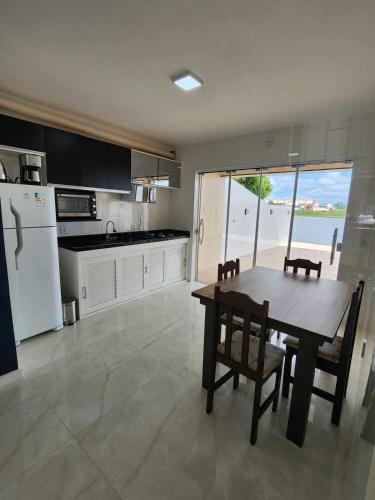 Passo de Torres Apartment | Apartamento-3 pé na areia, churrasqueira, acesso a lagoa, vista para rio, Torres e serra gaúcha