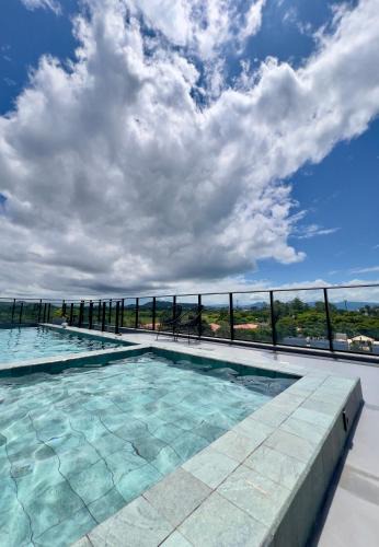 Cachoeira do Bom Jesus Apartment | Apartamento novo moderno proximo da praia