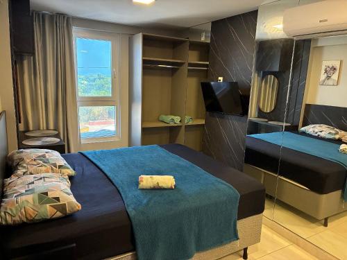 Bessa Apartment | Apartment 201/Oceanfront/Mirrored Bed/Kitchen