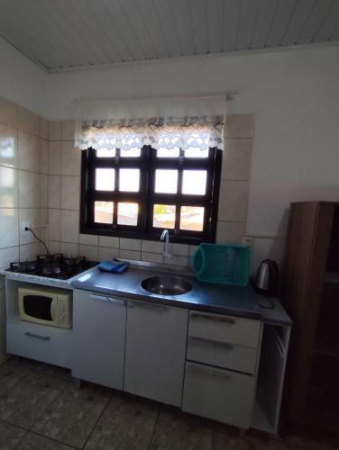 Arroio do Sal Apartment | Apto com terraço coberto