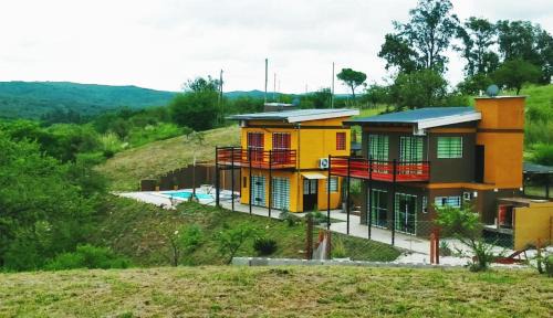 Cosquin House | Balcones de Molinari
