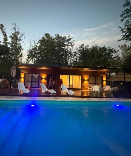 Oliveros House | Brisas del Bosque