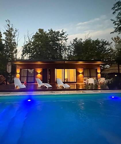 Oliveros House | Brisas del Bosque