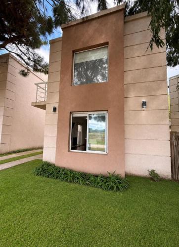 Santa Teresita House | Cabañas Aires del Bosque