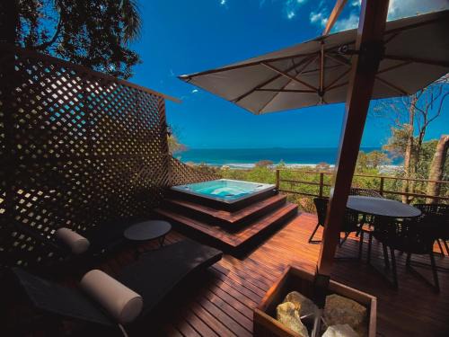 Rio das Pacas House | Cabana Romântica vista mar com duas spas privativas