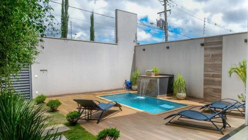 Franca House | Casa com Piscina Aquecida Churrasqueira e Hidro