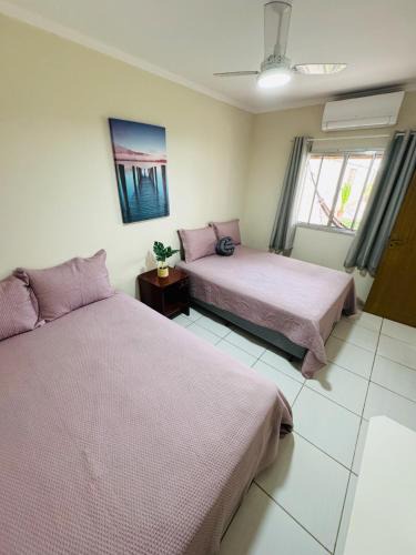 Praia do Morro Apartment | Casa de Praia com Piscina e Churrasqueira a 280m da Praia do Morro - 3 quartos com Ar Condicionado, sendo 2 suítes- Quintal amplo, ideal para famílias