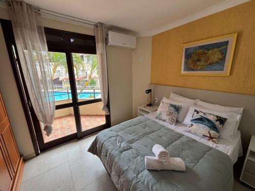 Ponta das Canas Apartment | Casa em condominio clube na beira da praia