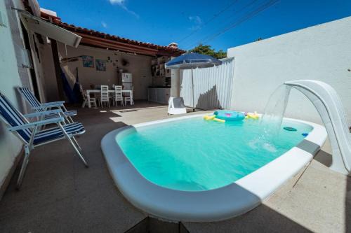 Ponta de Matos House | Casa em Praia Formosa com 4 Suítes, Piscina, Churrasqueira e Garagem