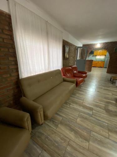 Comuna de San Roque Apartment | Casa en complejo con pileta compartida