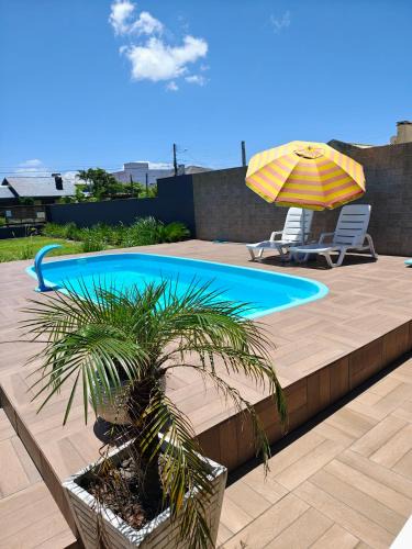 Capao da Canoa House | Casa ,piscina há 100 metros do mar ,24 pessoas