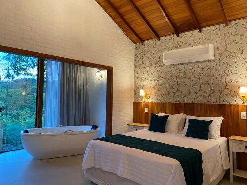 Santa Teresa Ski Chalet | Chalés Colina dos Colibris