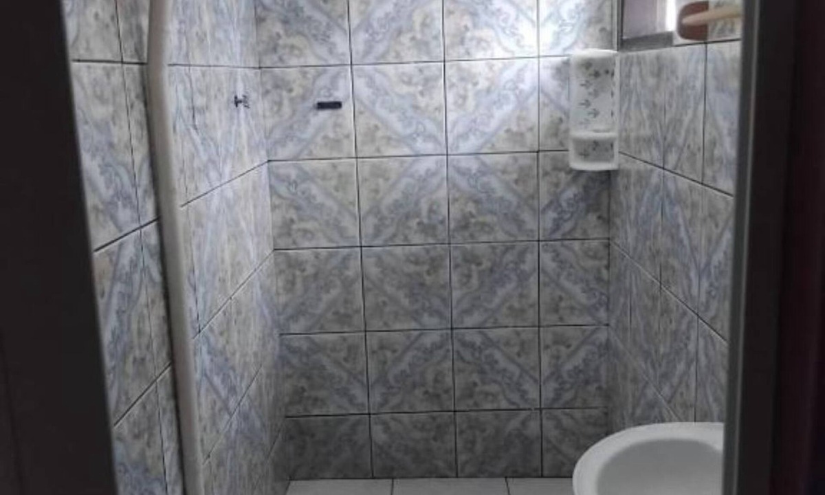 Pereque House | Comfortable accommodation with air conditioning and a fan. Well-Maintained Suite #3