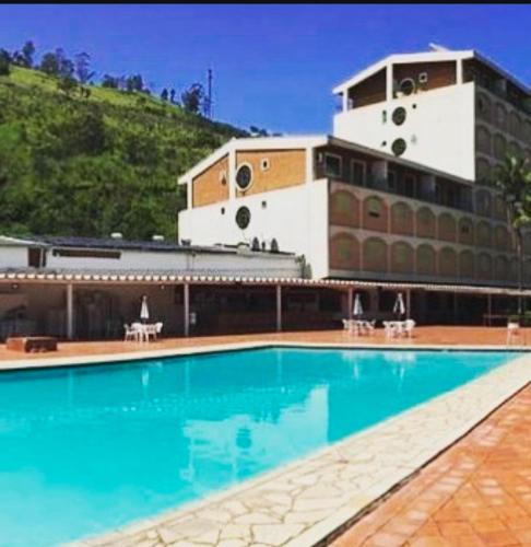Aguas de Lindoia Hotel | Flat Cavalinho Branco - Ap 136