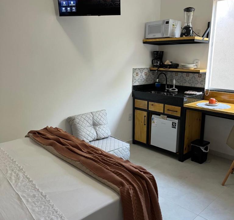 Jardim Ipe Apartment | Flat com ar e varanda com linda vista para o Ibituruna, Wi-Fi - Véu de Noiva 204