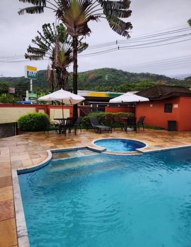 Juquehy Apartment | Flat em Juquehy - Condomínio com portaria e com piscina próximo praia
