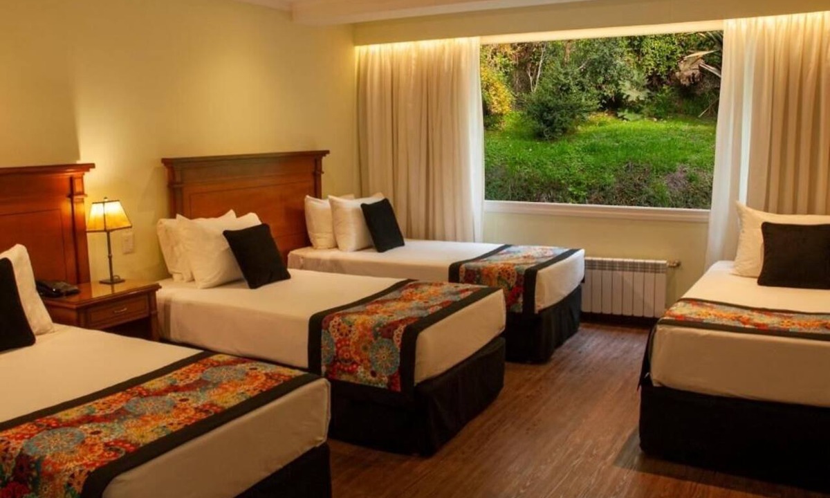 San Carlos de Bariloche Hotel | Four Garden-View Quads + Free Breakfast | 19-min Walk Chocolate Museum