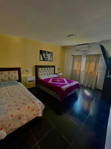 Comuna Estancia Vieja House | Jacarandá