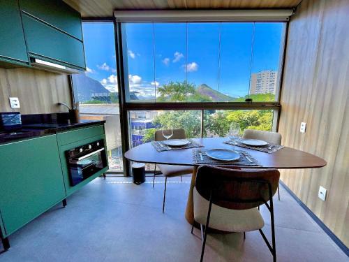 Leblon Apartment | Leblon Studio - View of the Christ, pool and gym.
