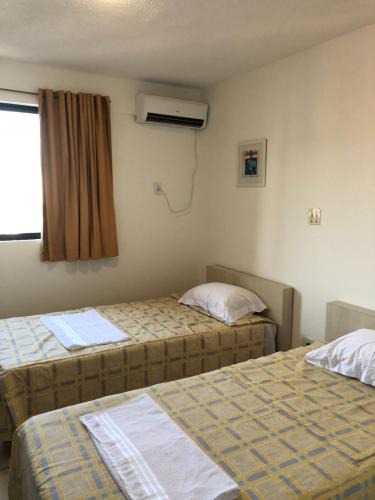 Ponta do Farol Hotel | Melo Hospedagem - Flat Bellagio