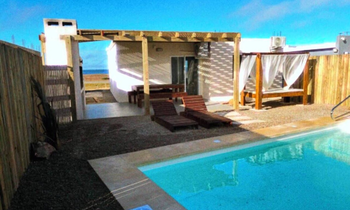 Punta Negra House | Oceanfront, heated pool, barbecue area, pet-friendly, relaxation and comfort