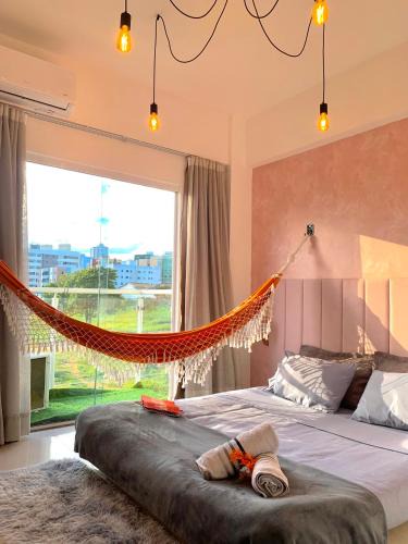 Candeias Apartment | Pôr do sol na sacada, lareira e cinema no Candeias