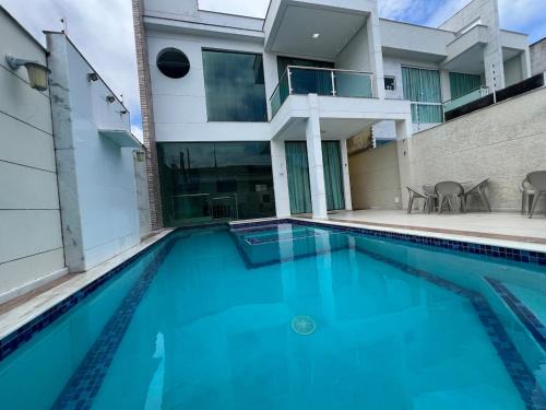 Taperapua Beach House | Paulo Gonzaga · Refúgio beira-mar 4 suítes - Praia Taperapuan