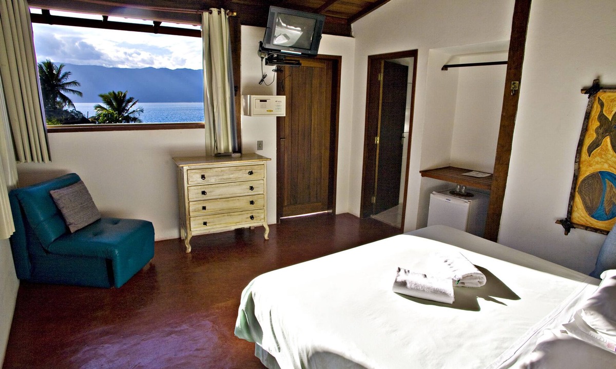 Veloso Hotel | Pousada Isola Bella - Sobre o Mar