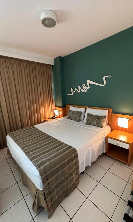 Praia do Canto Apartment | Praia do Canto Apart Hotel quarto sala e varanda