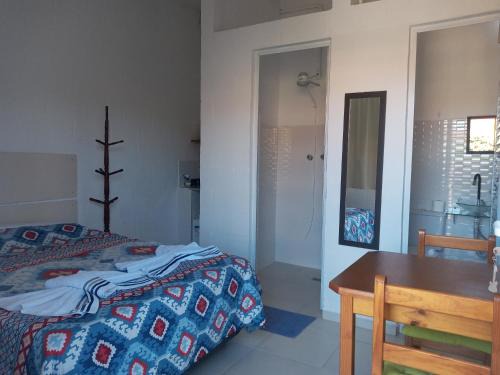 Sao Bento do Sapucai Apartment | Quarto Aconchegante