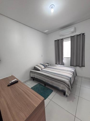Bacabal House | Quarto Executivo em Bacabal-MA - TV, Frigobar e Ar-condicionado