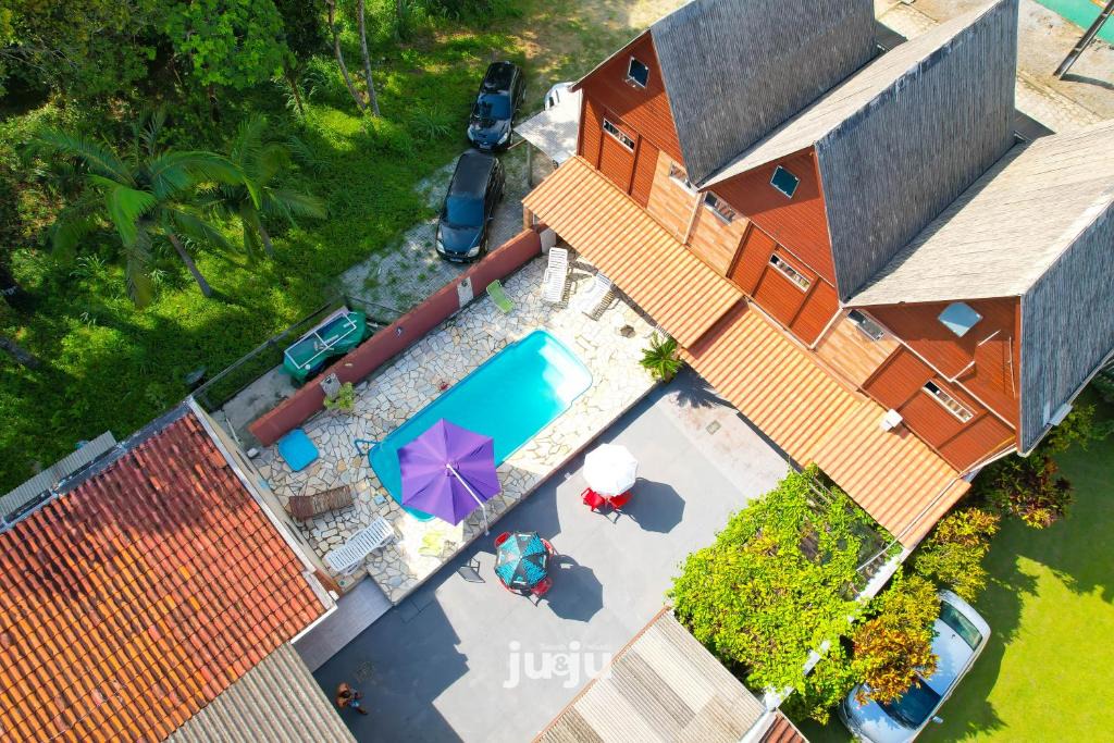 Balneario Praia do Leste Ski Chalet | Recanto Pousada JU&JU Chalé com PISCINA COMPARTILHADA