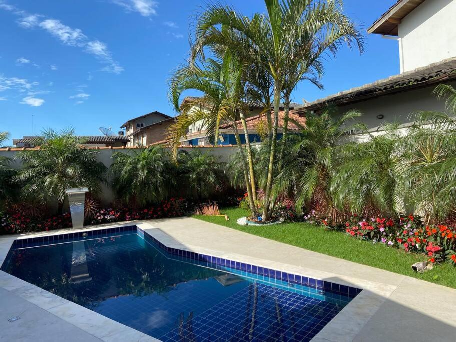 Morada da Praia House | Sobrado moderno, piscina privativa, condomínio Morada da Praia!