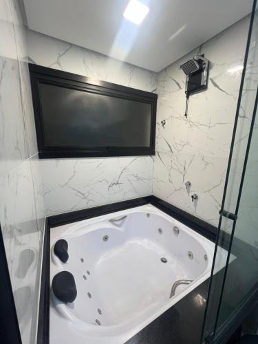 Torres Apartment | Suíte completa com cozinha e hidromassagem