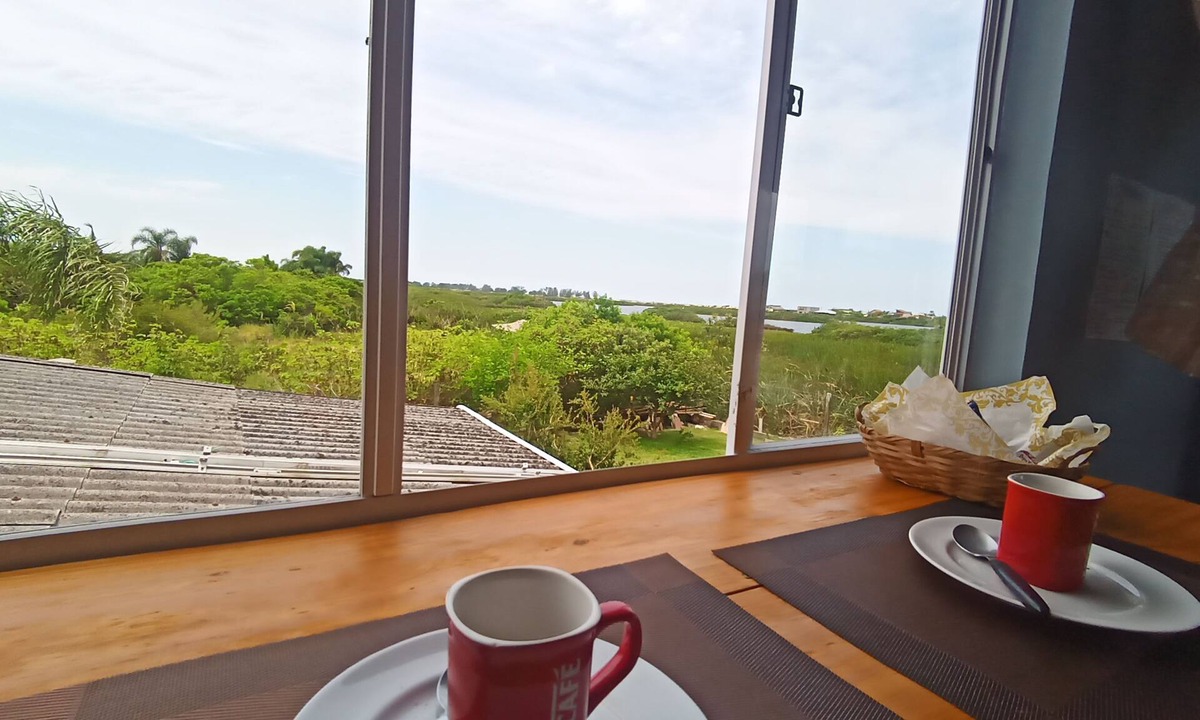 Passo de Torres Cabin | Suite with kitchen, overlooking the lagoon. In Passo de Torres