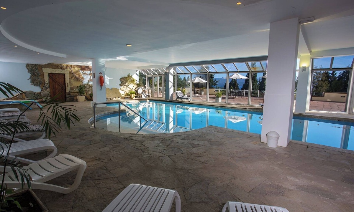 San Carlos de Bariloche Hotel | Triple Lake View Stay | Free Breakfast & Onsite Spa | 0.3 Mi to Playa Melipal