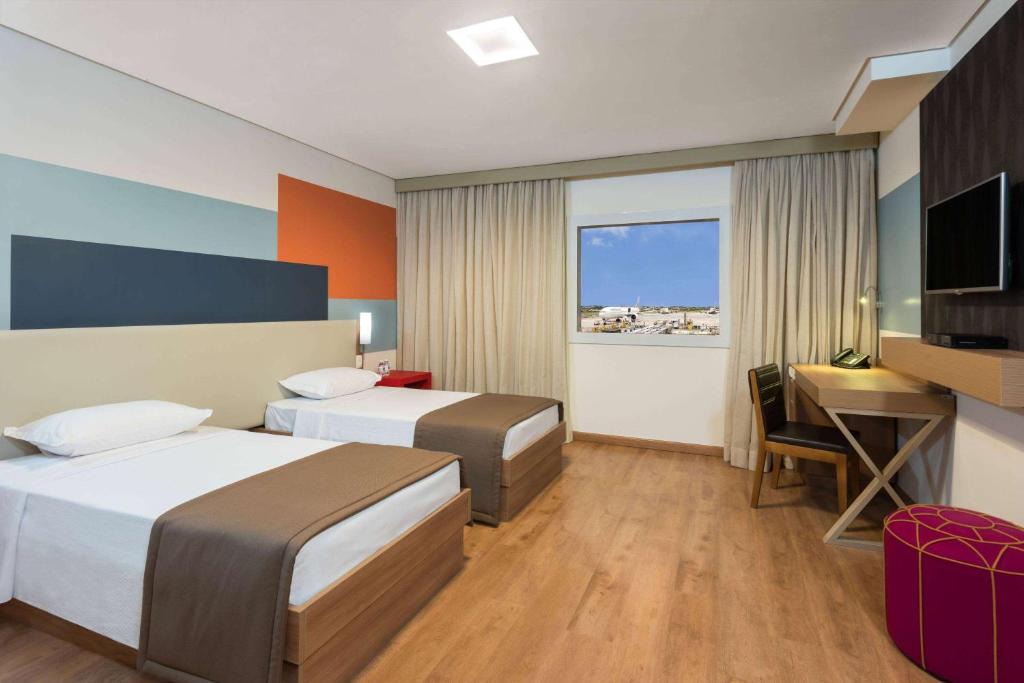 Aeroporto Internacional Governador Andre Franco Montoro Hotel | TRYP BY WYNDHAM São Paulo Airport - Hotel de Transito Terminal 3 INTERNACIONAL - Lado Ar - Área restrita á passageiros já embarcados e sem bagagens para despachar - Transit Hotel, only carry-on