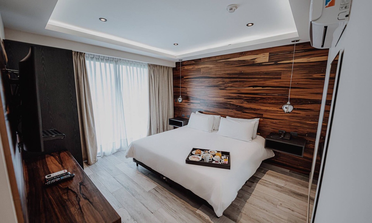 Rio Cuarto Hotel | Unwind in a Nature-Inspired Room with Balcony Views | 0.7 mi to Cathedral Church