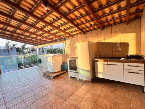 Vargem do Bom Jesus Apartment | varanda aconchego
