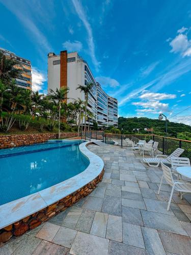 Parque Enseada Apartment | Vista para Oceano e Ar condicionado