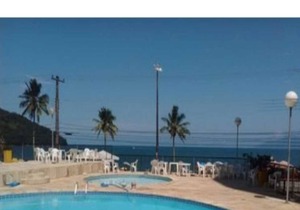 FOOT IN THE SAND WITH POOL / BEACH MARTIM DE SÁ