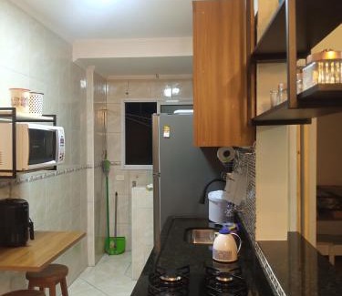 Mirim Apartment | Apto Com Sacada e Ar Condicionado a 2 minutos da Praia