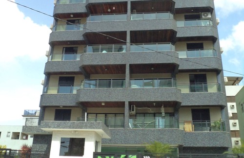 Asturias Apartment | Beautiful apartment. Asturias-Guarujá, with balcony and free Wi-Fi, 150 m from the beach.