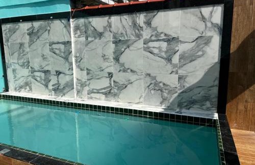 Caicara House | Casa à 300 metros da PRAIA com PISCINA, CHURRASQUEIRA e 2 VAGAS DE GARAGEM!