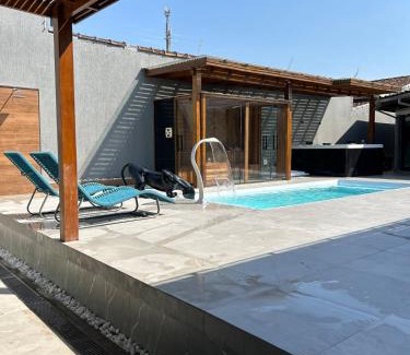 Jardim Britania House | Casa Coral